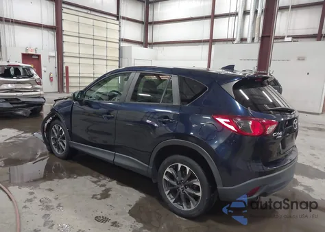 2016 Mazda Cx-5 Grand Touring z USA, uszkodzony, nr VIN JM3KE4DY1G0807534